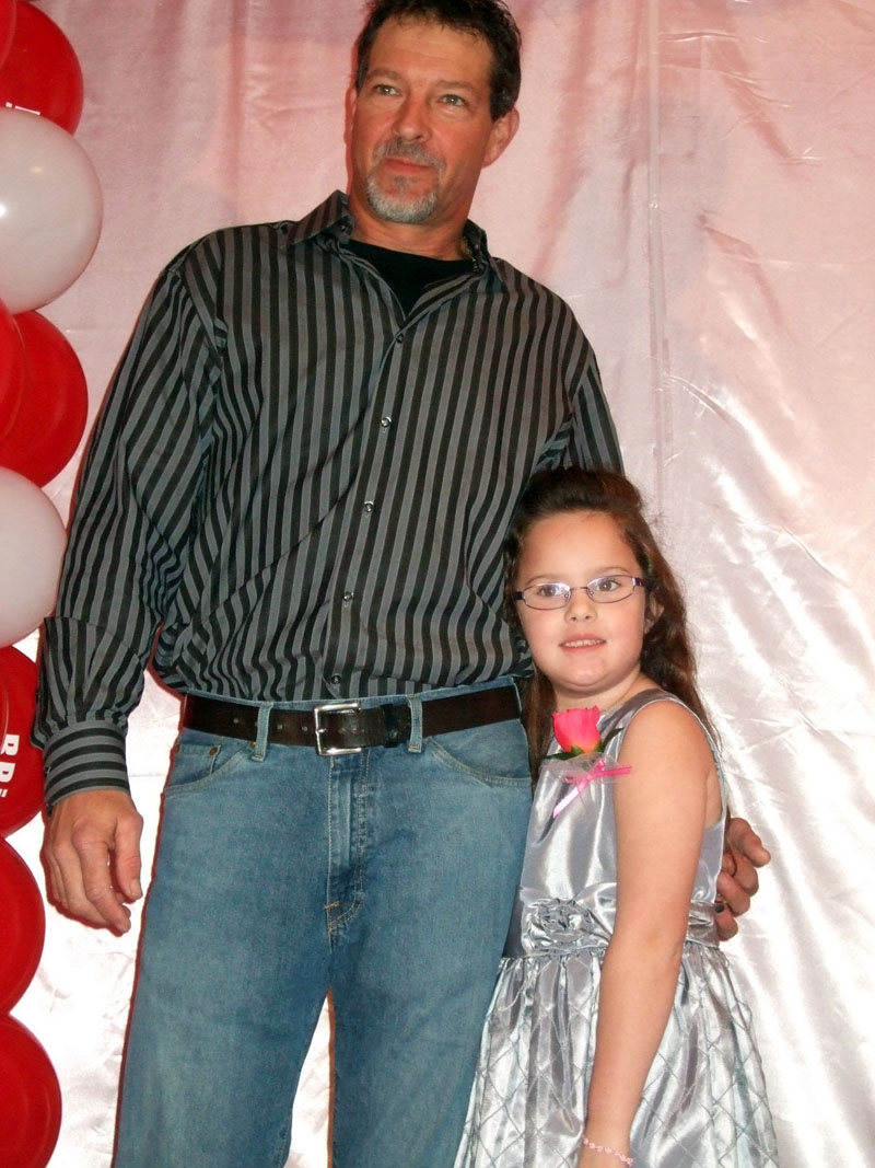 photo of a dad and daughter